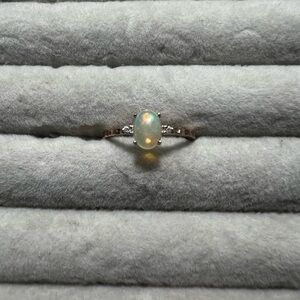 Elegant Opal and Quartz Ring